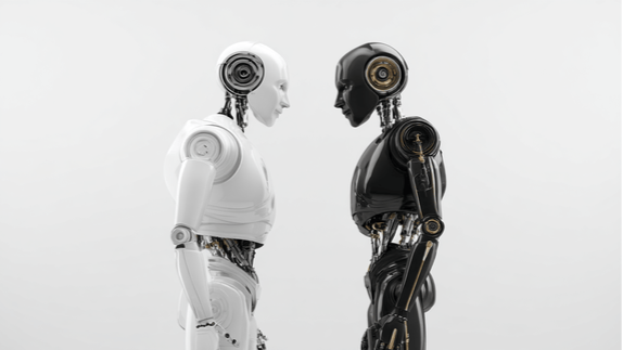 A black robot, representing evil, and a white robot, representing good, standing facing each other 