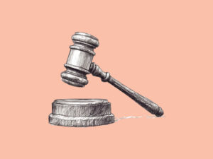 An AI-generated image of a legal gavel (Tesla sues its former engineer)
