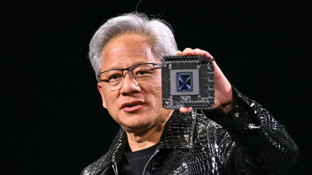 Nvidia CEO, Jensen Huang holding up an AI chip 